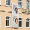 Mesh banner in portrait format with event announcements