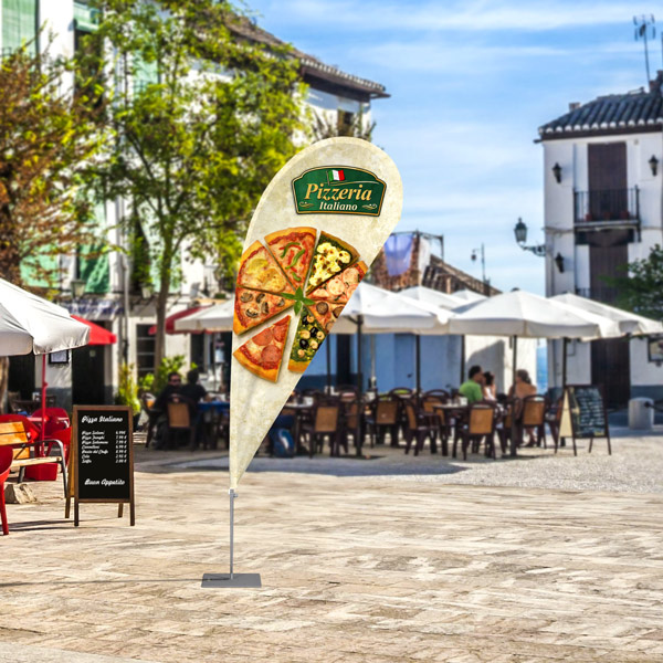 Beachflag teardrop as promotional material in front of restaurants or bars