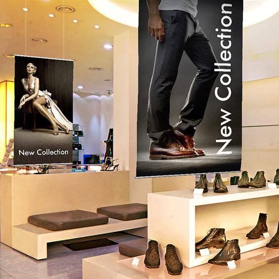 Fabric banner with metal edging, for store fixtures
