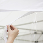 Attachment of the wall to the valance using hook-and-loop tape