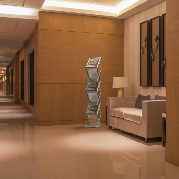 Brochure stand with informational materials in the foyer