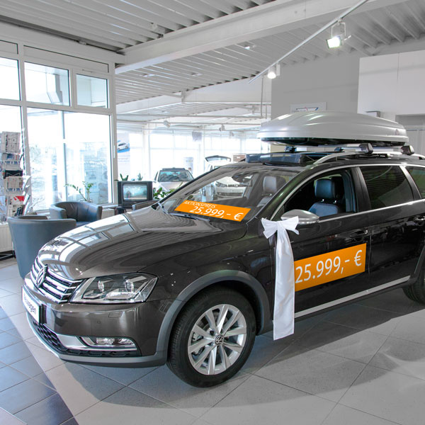 Adhesive films in landscape format, for paint-protective advertising on vehicles