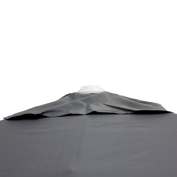 Air hood at the top of the umbrella for increased stability in gusts of wind