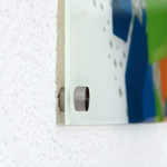 Poster with stainless steel wall standoff mounts, 5 mm wall offset