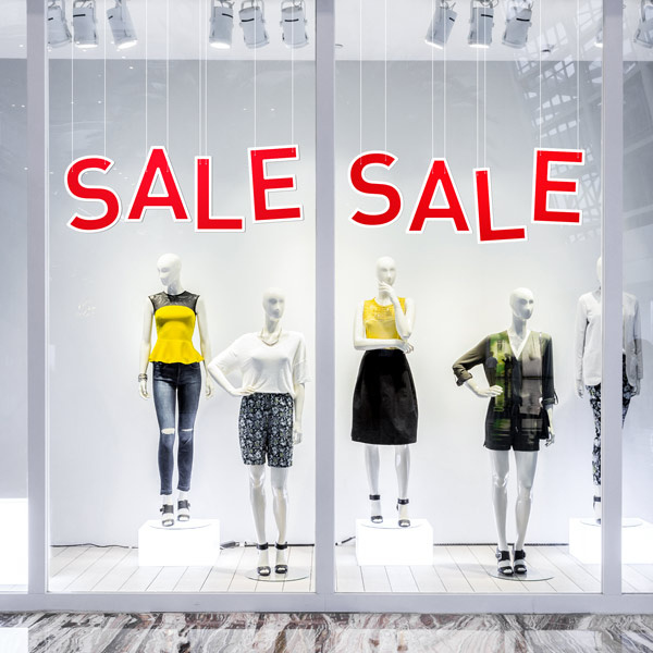 SALE as window display decoration (suspended, attachment e.g. with nylon cord)