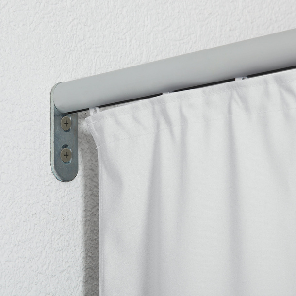 Curtain with curtain tape, wall mounting with profile holder