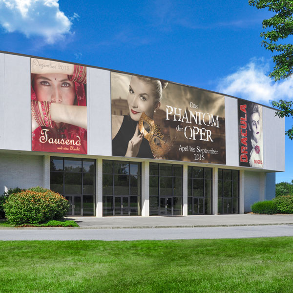 large-format advertising tarpaulins with current theater schedule