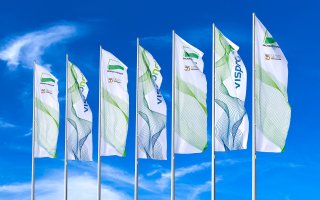 Flag advertising with GREEN Plus